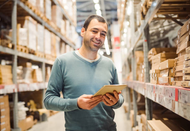 istock Manager doing stocktaking of product in warehouse 1130783472