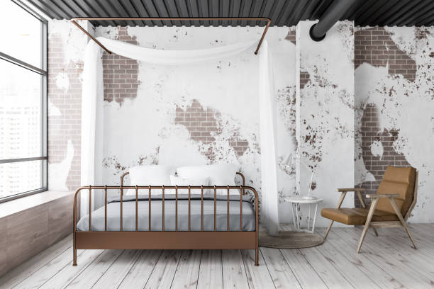istock Grunge master bedroom with armchair 1130783573