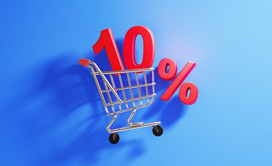 Ten percent  discount sign in a shopping cart on blue background. Horizontal composition with  copy space. Shopping concept.