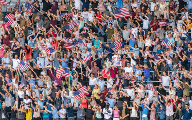istock USA supporters waving their flags on a stadium 1130790166
