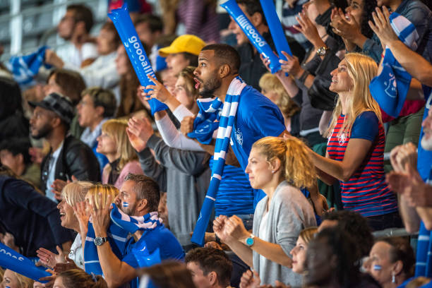 istock Fans in blue jerseys watching a match in shock 1130790193