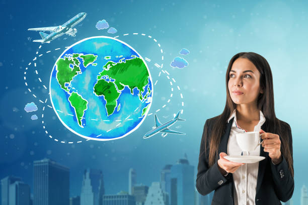 istock Woman with drawn globe and coffee 1130795276