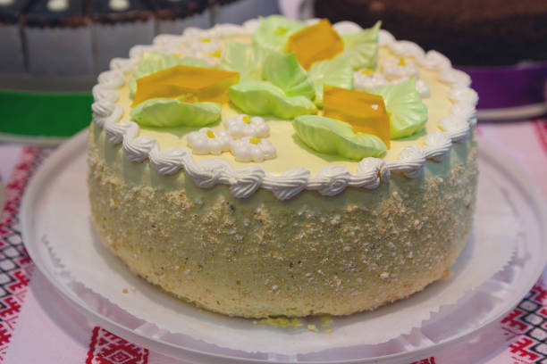 istock Beautiful delicious cake with biscuit cream and nuts. Dessert 1130796282