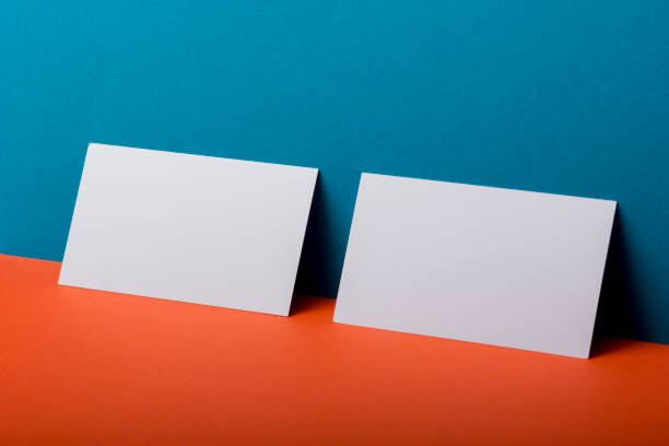 istock Business cards blank. Mockup on color background. Flat Lay. copy space for text 1130796405