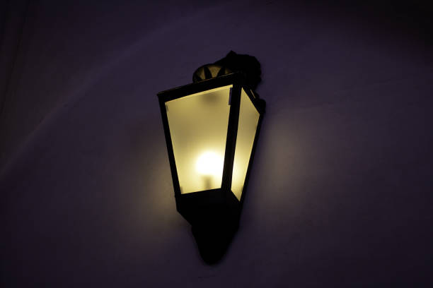 istock Street lamp lit at night 1130800717