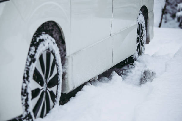istock Snow and cars 1130802126