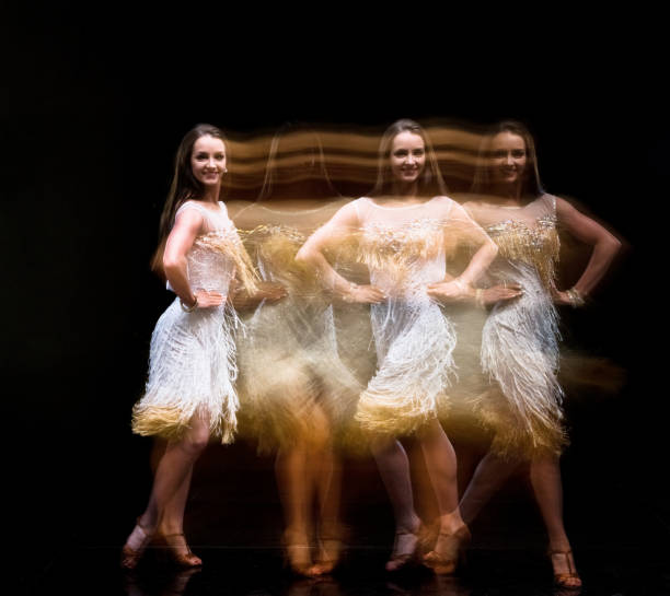 istock Beautiful woman ballroom dancing with motion blur 1130805970