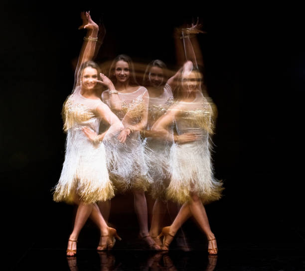 istock Beautiful woman ballroom dancing with motion blur 1130805992