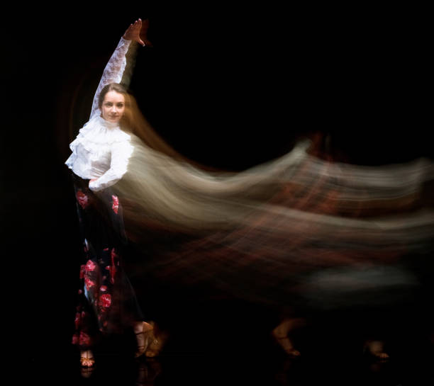 istock Beautiful female ballroom dancing - motion blur 1130806565