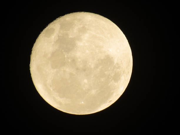 istock Super Full moon on the black night 1130808492