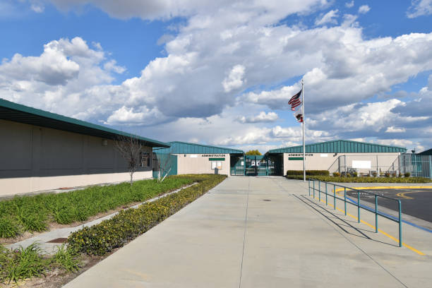 istock School Entrance with Fluffy Clouds 1130809249