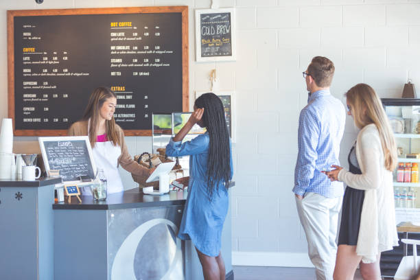 istock Customers ordering at a coffee shop counter 1130811346