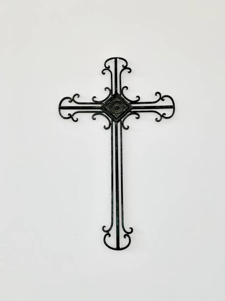 Iron cross to be placed on the wall Cross made of iron designed to hang on the wall iron cross stock pictures, royalty-free photos & images