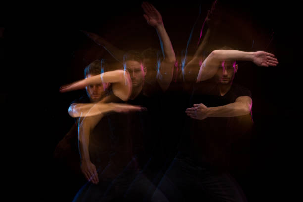 istock Good looking man in a black shirt dancing 1130817567
