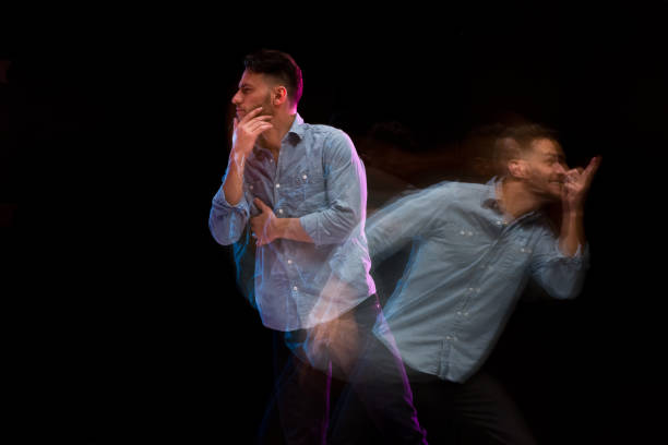 istock Handsome man in a blue shirt dancing 1130817568