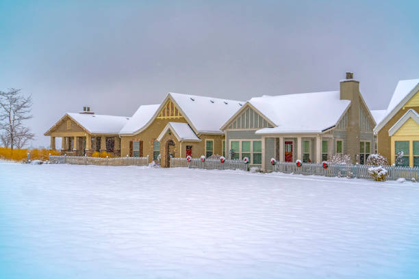 istock Winter landscape with snowy homes in Daybreak Utah 1130828398