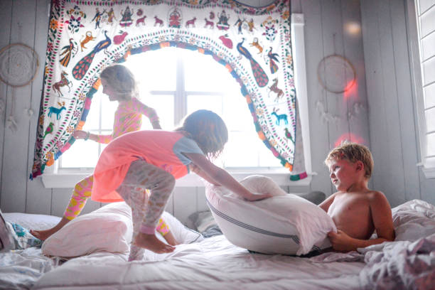 istock Pillow fight Dance party sleepover chaos and kids 1130833963