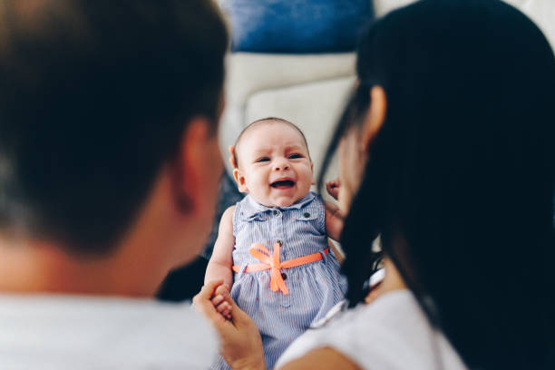 istock New baby at home with mom and dad 1130833995