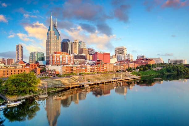 Nashville, Tennessee downtown skyline Nashville, Tennessee downtown skyline at Cumberland River. nashville stock pictures, royalty-free photos & images