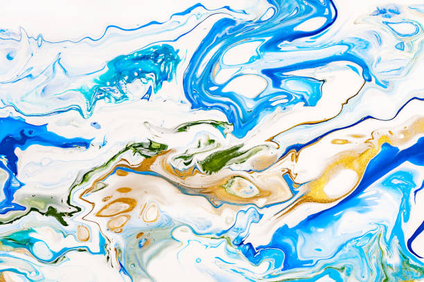 istock Hand painted background with mixed liquid blue, white, yellow paints. Abstract fluid acrylic painting. Applicable for packaging, invitation, textile, wallpaper, design of different surfaces 1130846606
