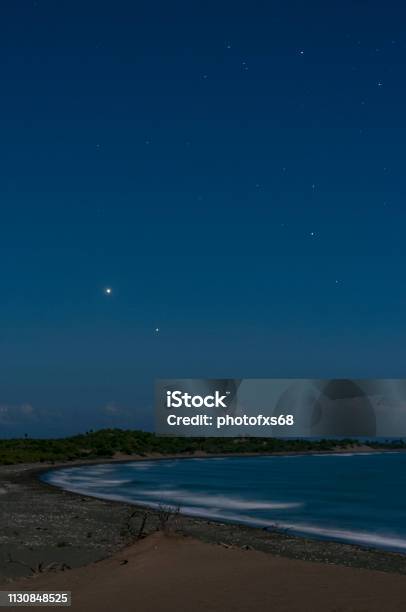 Venus And Jupiter Conjunction Over The Beach Stock Photo - Download Image Now - Arid Climate, Astronomy, Beach