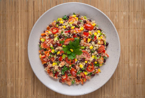 istock Mexican black bean corn quinoa salad. Top view 1130851179