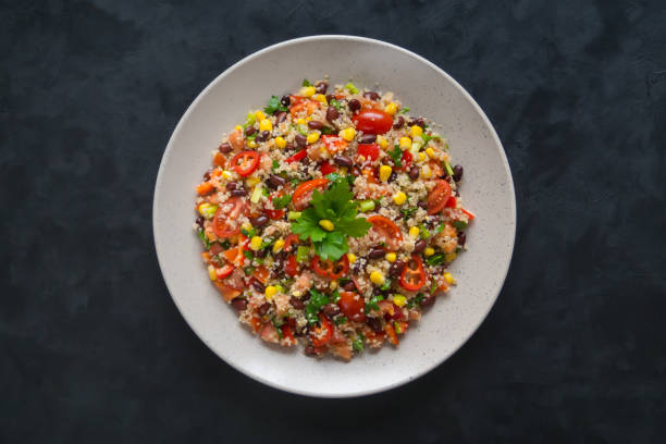 istock Mexican black bean corn quinoa salad. Top view 1130851240