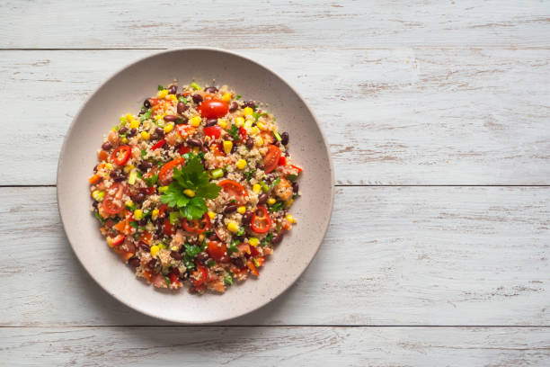 istock Mexican black bean corn quinoa salad on the table. 1130851299