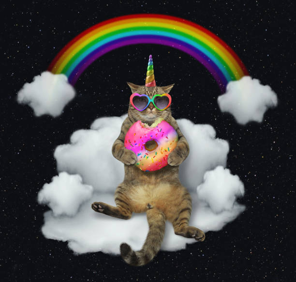 istock Cat unicorn with the color donut on a cloud 1130855169