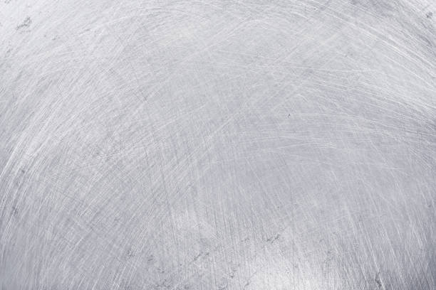 istock aluminium texture background, scratches on stainless steel. 1130855353