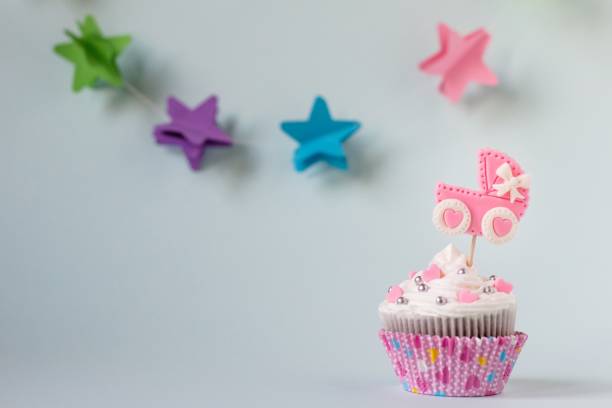 istock Baby shower cupcake for a girl. Text space 1130857812