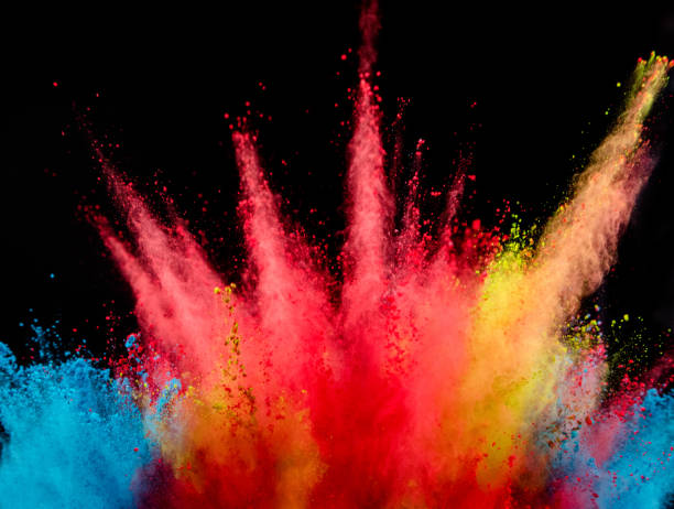 istock Explosion of colored powder on black background 1130864923