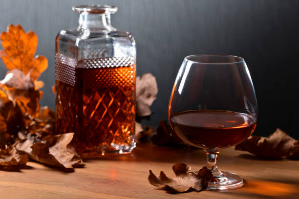 istock Brandy and dried up oak leaves . 1130867226