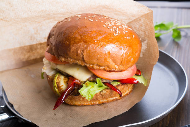 istock Hamburger served on a small frying pan 1130868197
