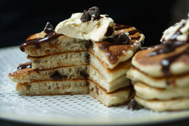 istock cut choco chips and banana pancakes 1130869545