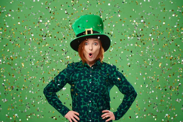 Portrait of screaming leprechaun under a shower of confetti