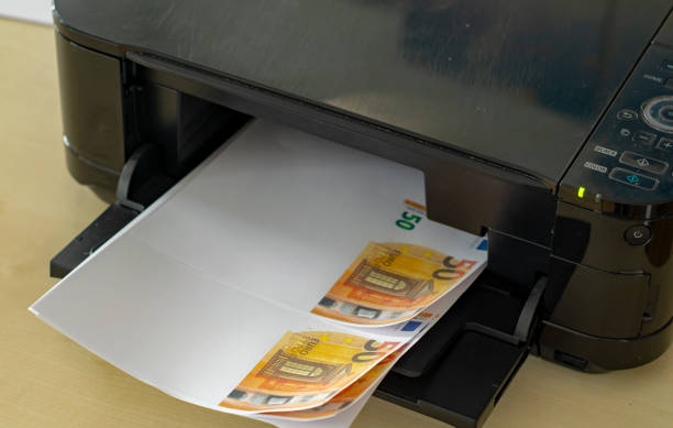 istock Himself printing his counterfeit money 1130872560