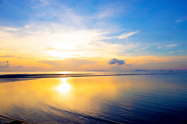 sunset on the beach for natural background stock photo