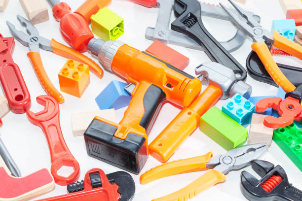 istock Toy tools and cubes on a light background. Toy for children 1130874075