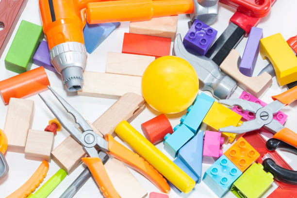 istock Toy tools and cubes on a light background. Toy for children 1130874517