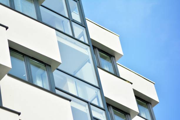 istock Modern apartment buildings on a sunny day with a blue sky. 1130875410