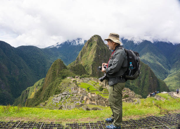 istock Photographer  at Machu Picchu 1130876889