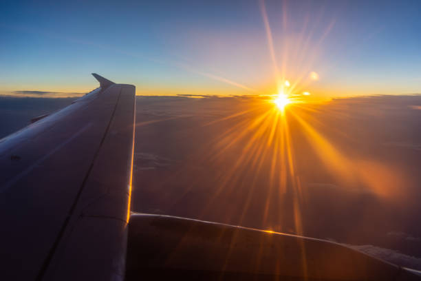 the plane flies over the cloud, the view from the window