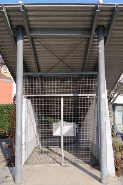 istock Modern garage entrance with locked lattice door 1130880791