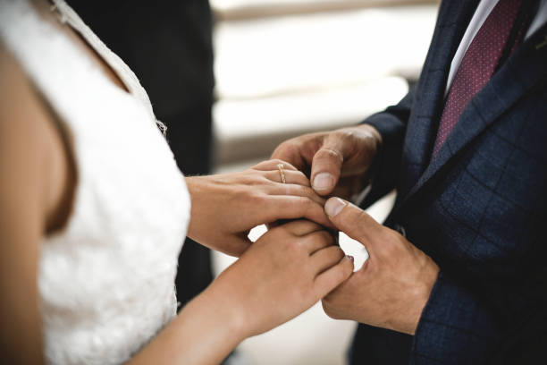 istock Bride and groom standing at the altar 1130881087
