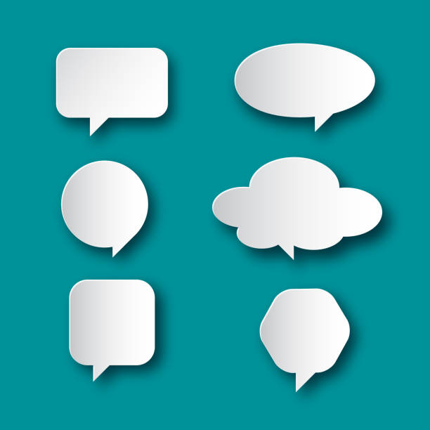 istock Speech Bubble Icons. Paper Cut Talk Symbols Shapes Set on Blue Background. 1130881993