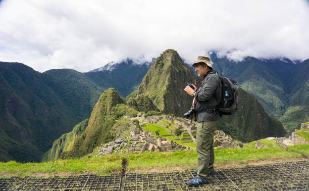 istock Photographer  at Machu Picchu 1130883636