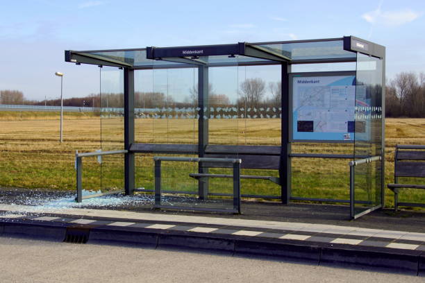 Vandalised bus shelter n the city of Almere. Almere Poort, the Netherlands - February 20, 2019: Vandalised bus shelter n the city of Almere. almere photos stock pictures, royalty-free photos & images