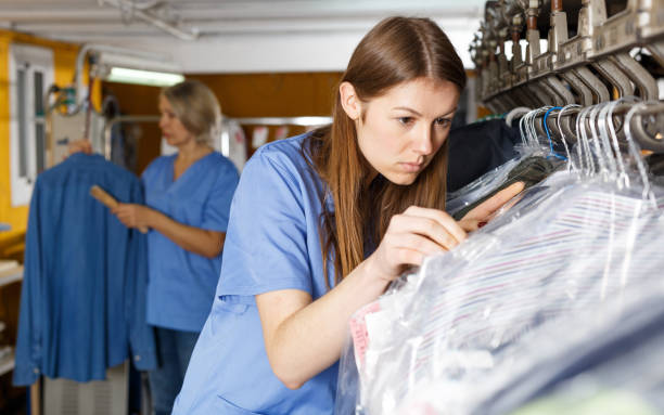 istock Two women working at dry-cleaning salon 1130887214