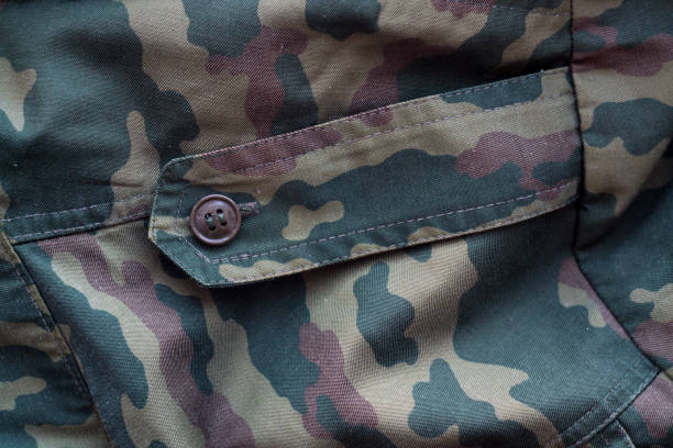 istock Dirty camouflage cloth with blur effect. 1130887851